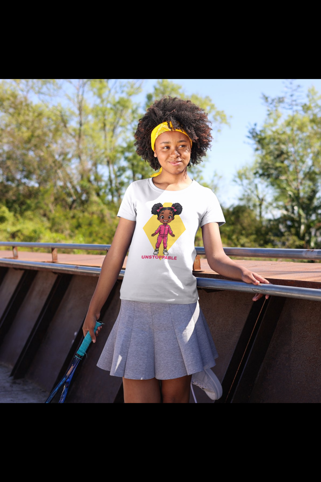 White organic cotton kids streetwear featuring empowering Unstoppable girl graphic. Global Family Threads UK.
